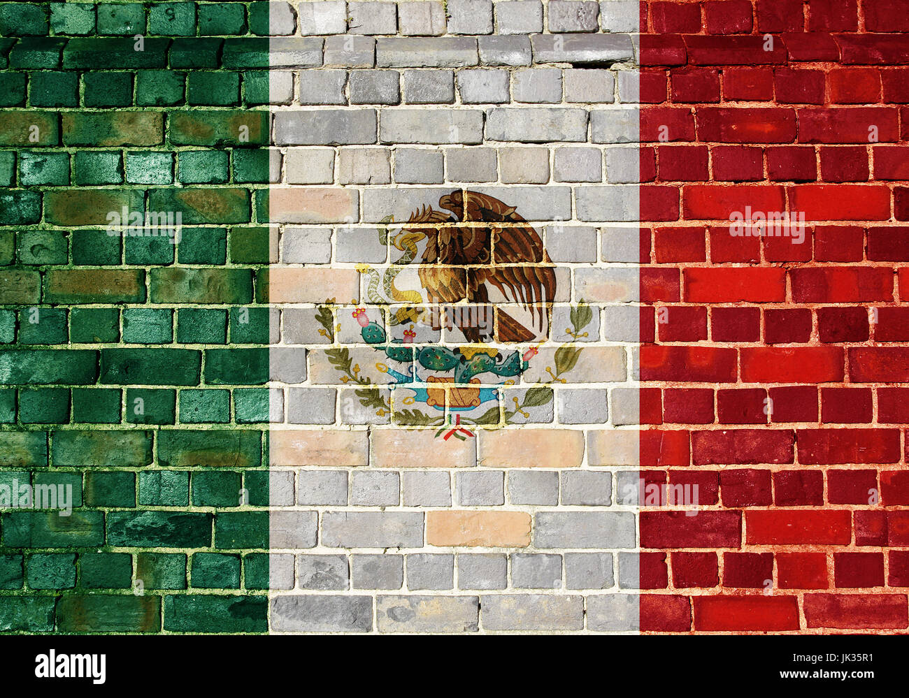 Mexican flag on an old brick wall background Stock Photo