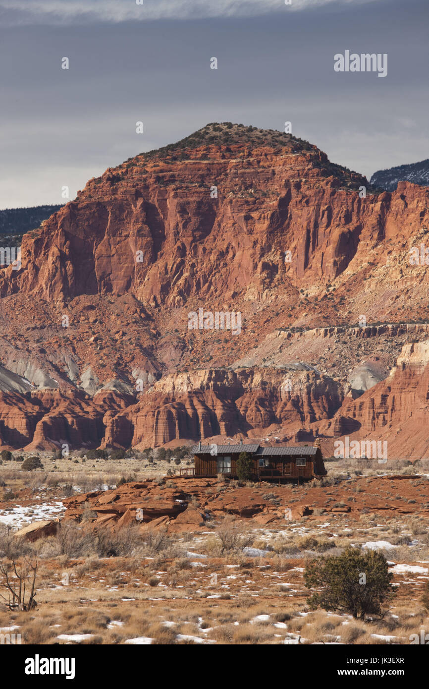 USA, Utah, Torrey, small ranch house and Waterpocket Fold of the