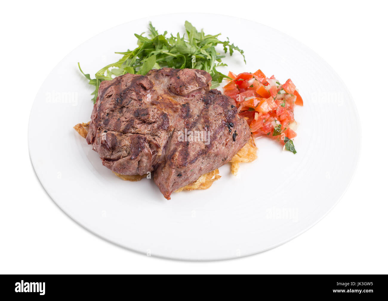 Entrecote steak with tomato tartar. Isolated on a white background