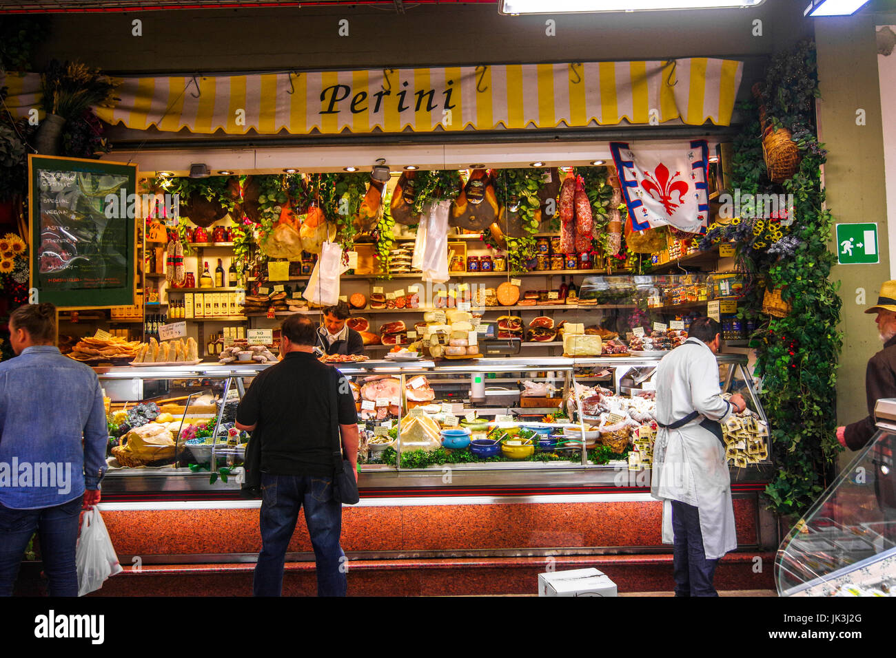 Delicatessen shop at the central food market in Florence Italy with many specialties on display Stock Photo