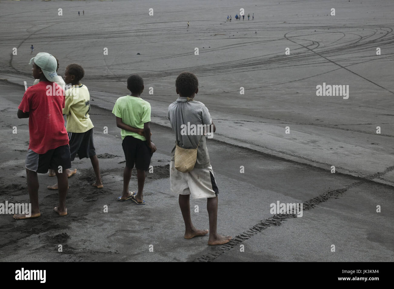 Vanuatu, Tanna Island, Mt. Yasur Volcano, elevation 361 meters, Islanders, no model release, at Moto Cross Race on the Volcano Ash Plain, Stock Photo