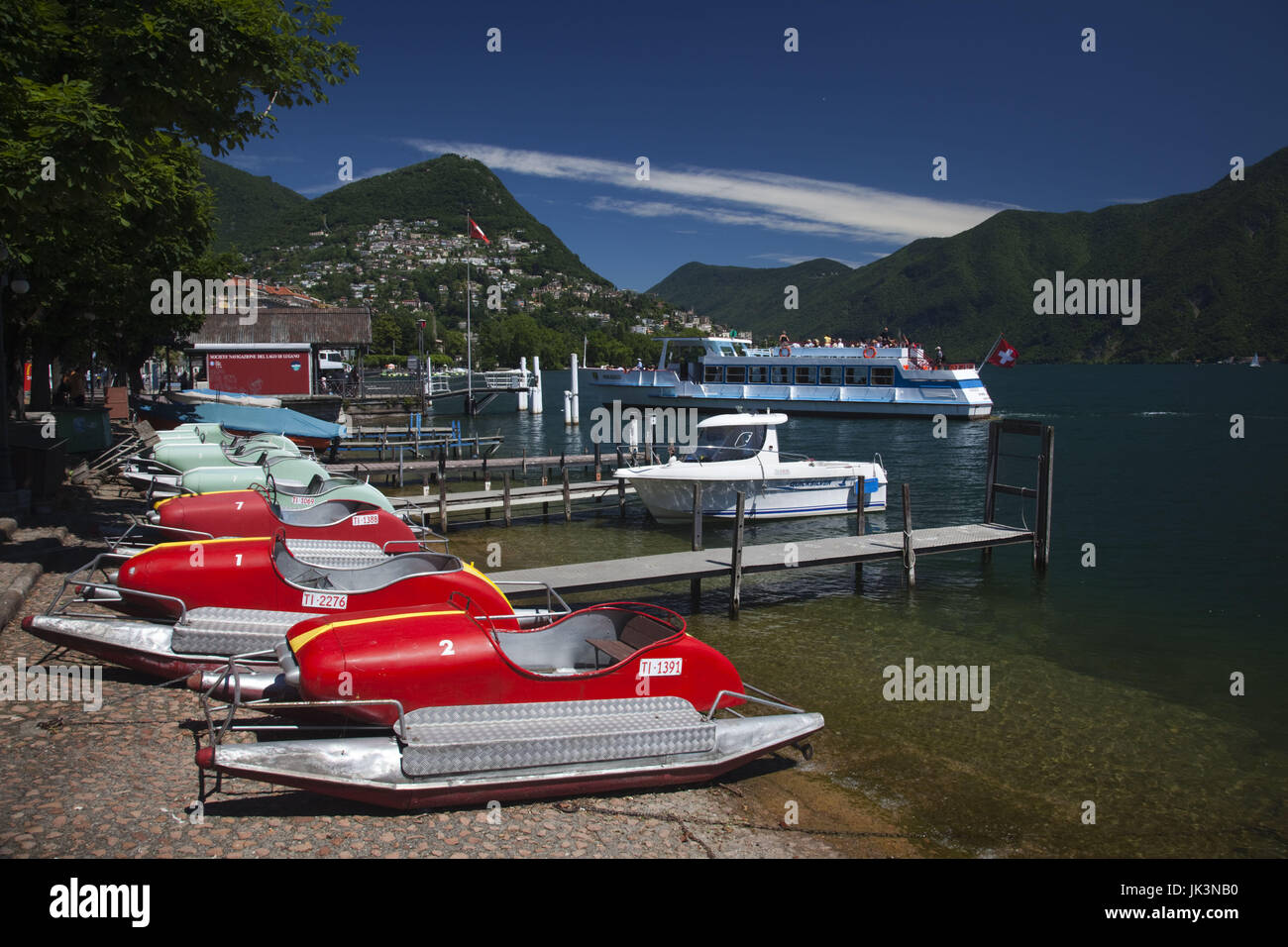 Switzerland, Ticino, Lake Lugano, Lugano, lakefront with paddleboats Stock Photo