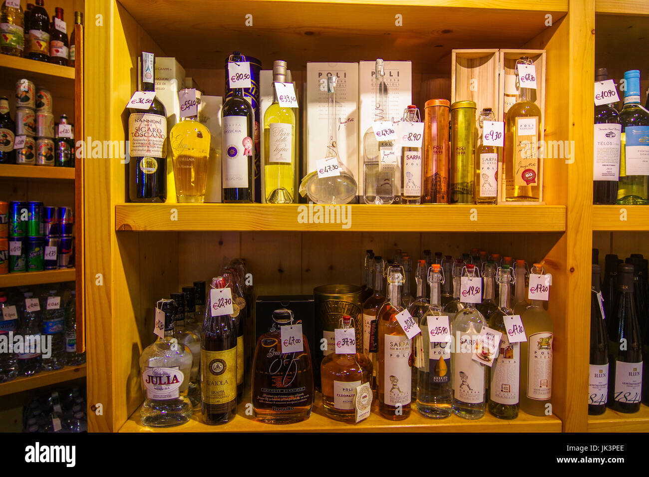 Selection of grappa on a shelf in a Liquor store in Florence Italy Stock Photo