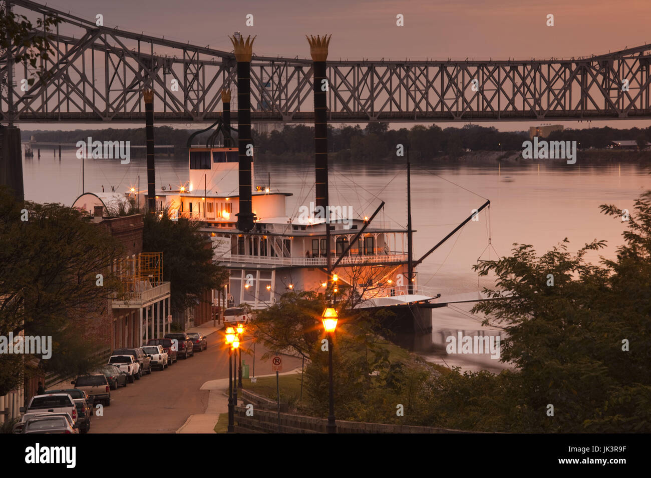 USA, Mississippi, Natchez, Natchez Under the Hill, former red-light area, with Isle of Capri Casino riverboat, dusk Stock Photo