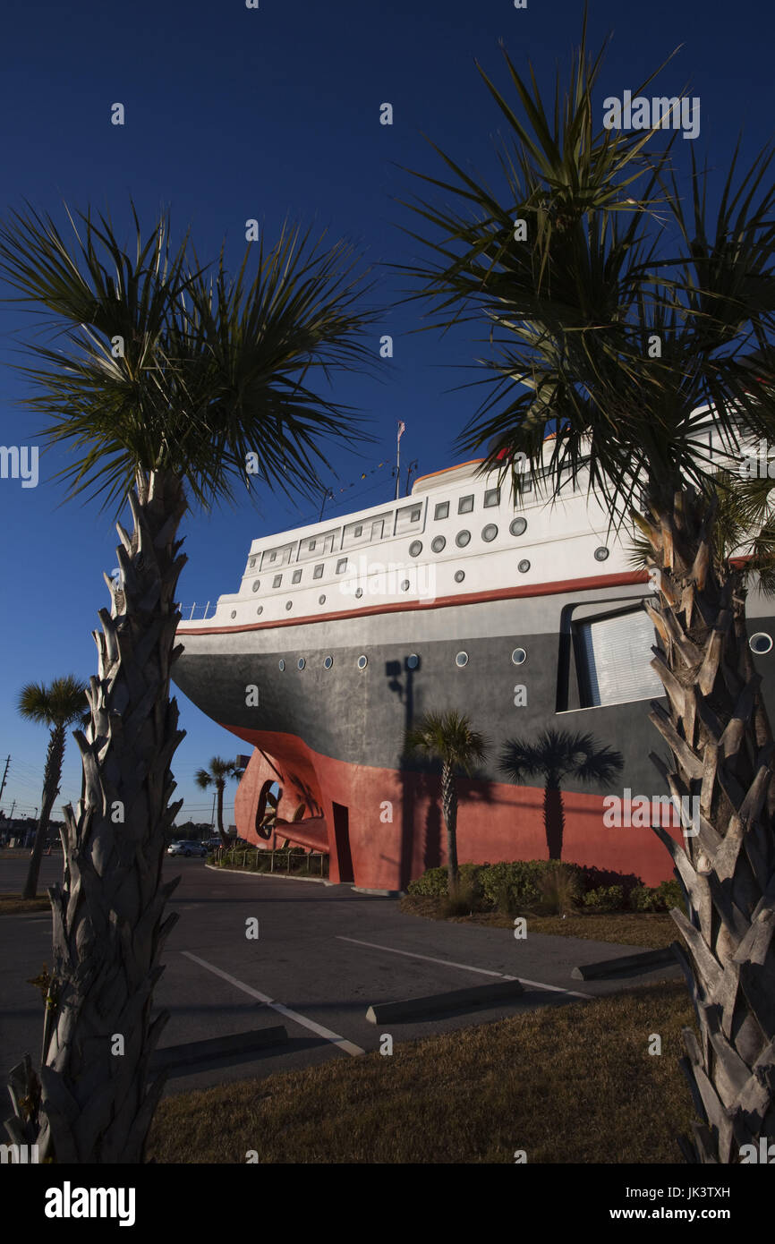 USA, Florida, Florida Panhandle, Panama City Beach, sinking ship motif of the Ripley's Believe it or Not Museum, late afternoon Stock Photo