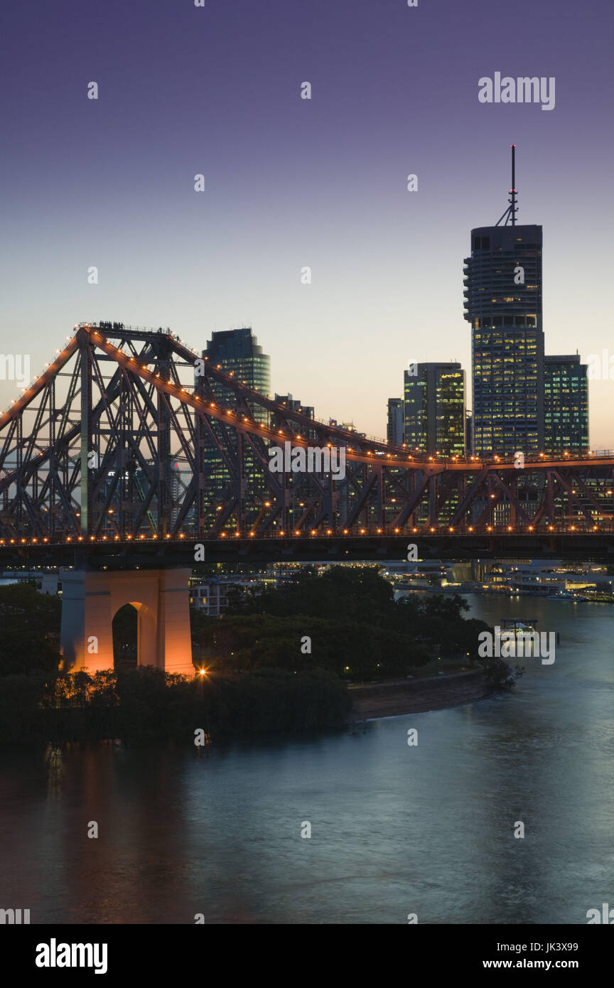 Australia, Queensland, Brisbane, Evening view of the Story Bridge with Riverside Centre Highrises, Stock Photo