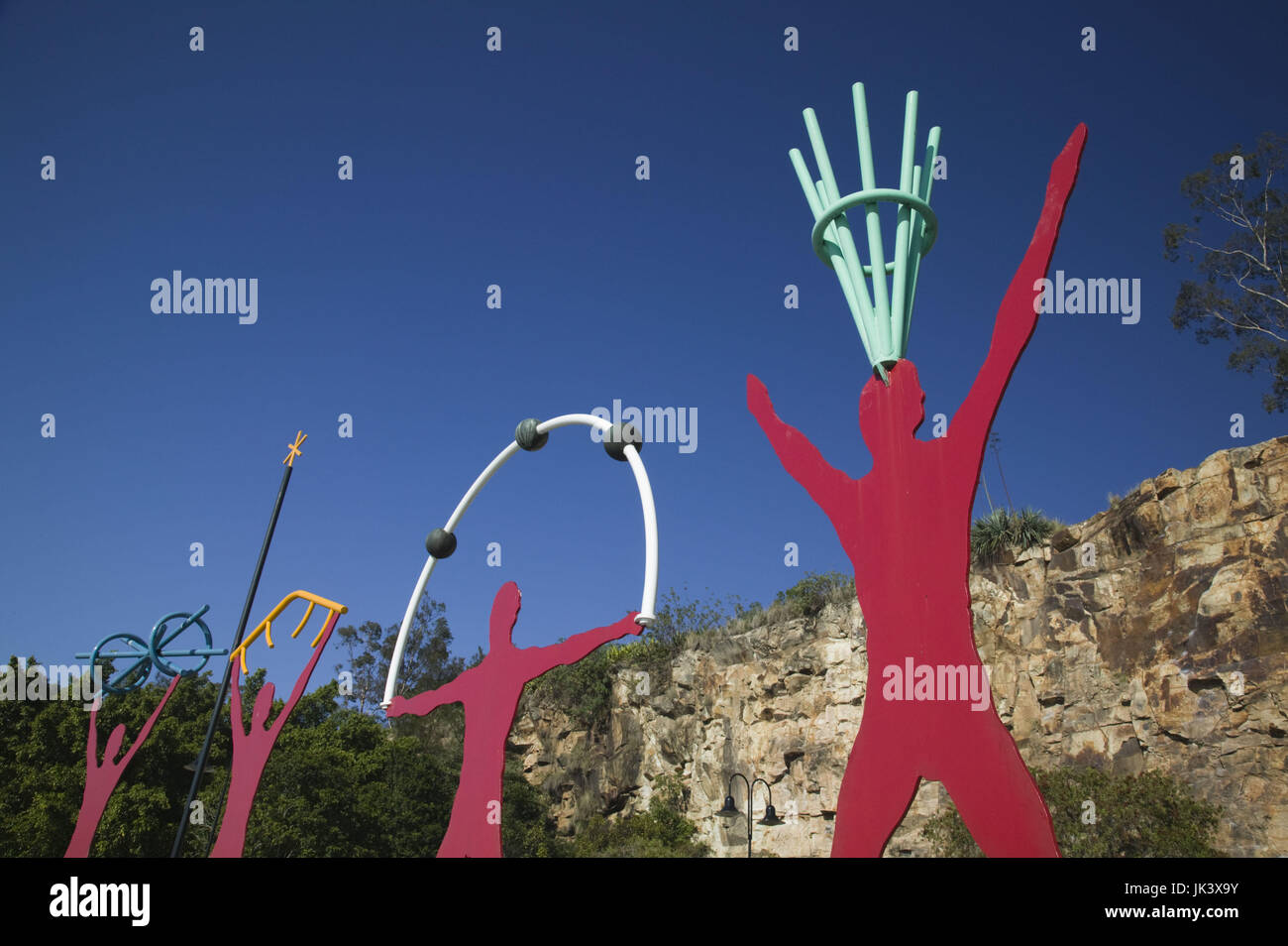 Australia, Queensland, Brisbane, Southbank District, View Red figures by the Cliffs Rock Cliff Climbing Area, Stock Photo