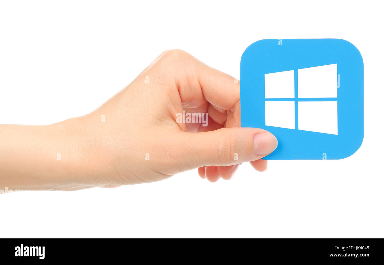 Kiev, Ukraine - May 17, 2016: Hand holds Microsoft Windows icon printed on paper Stock Photo