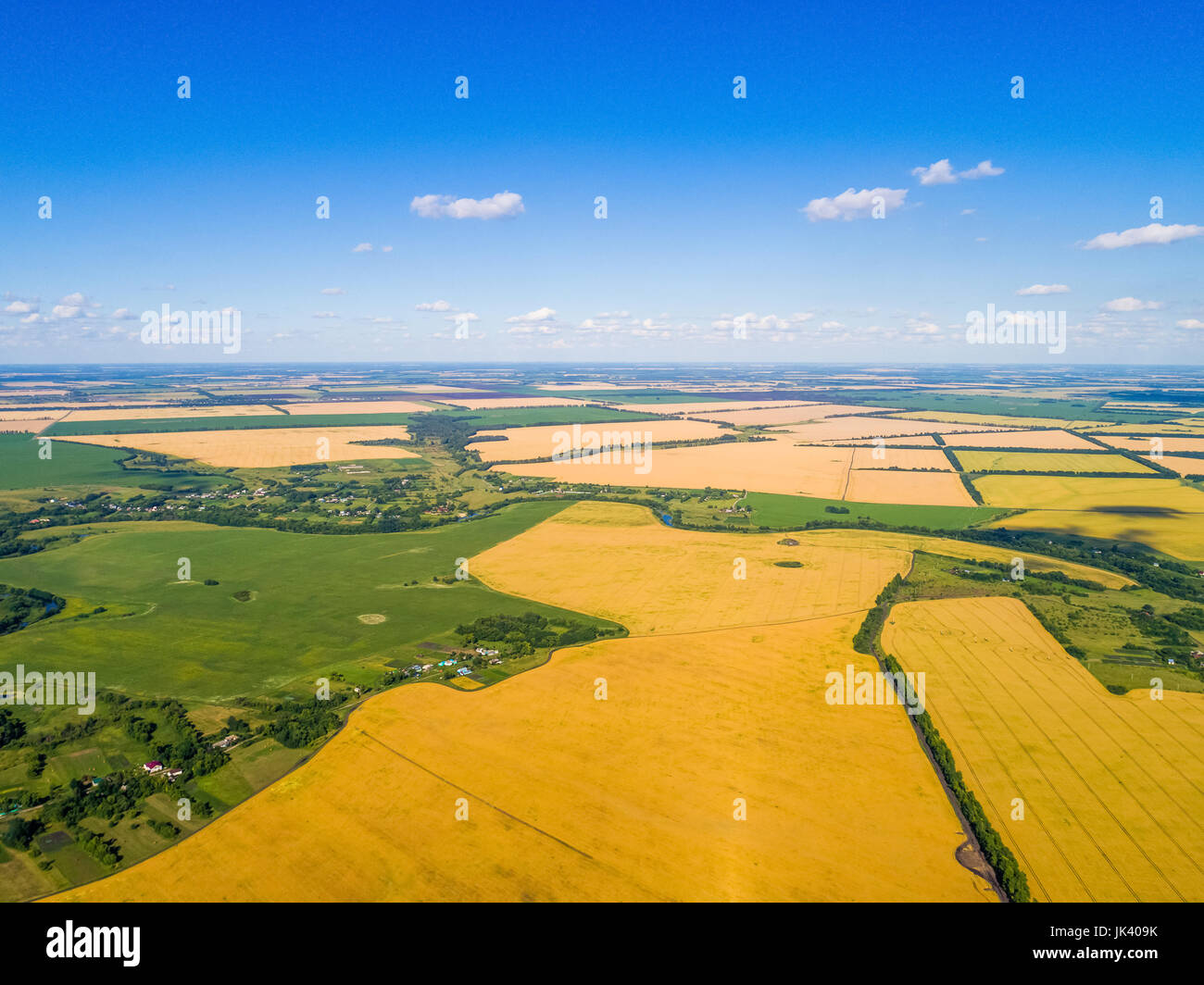 Rural landscape with village and cereal fields Stock Photo - Alamy