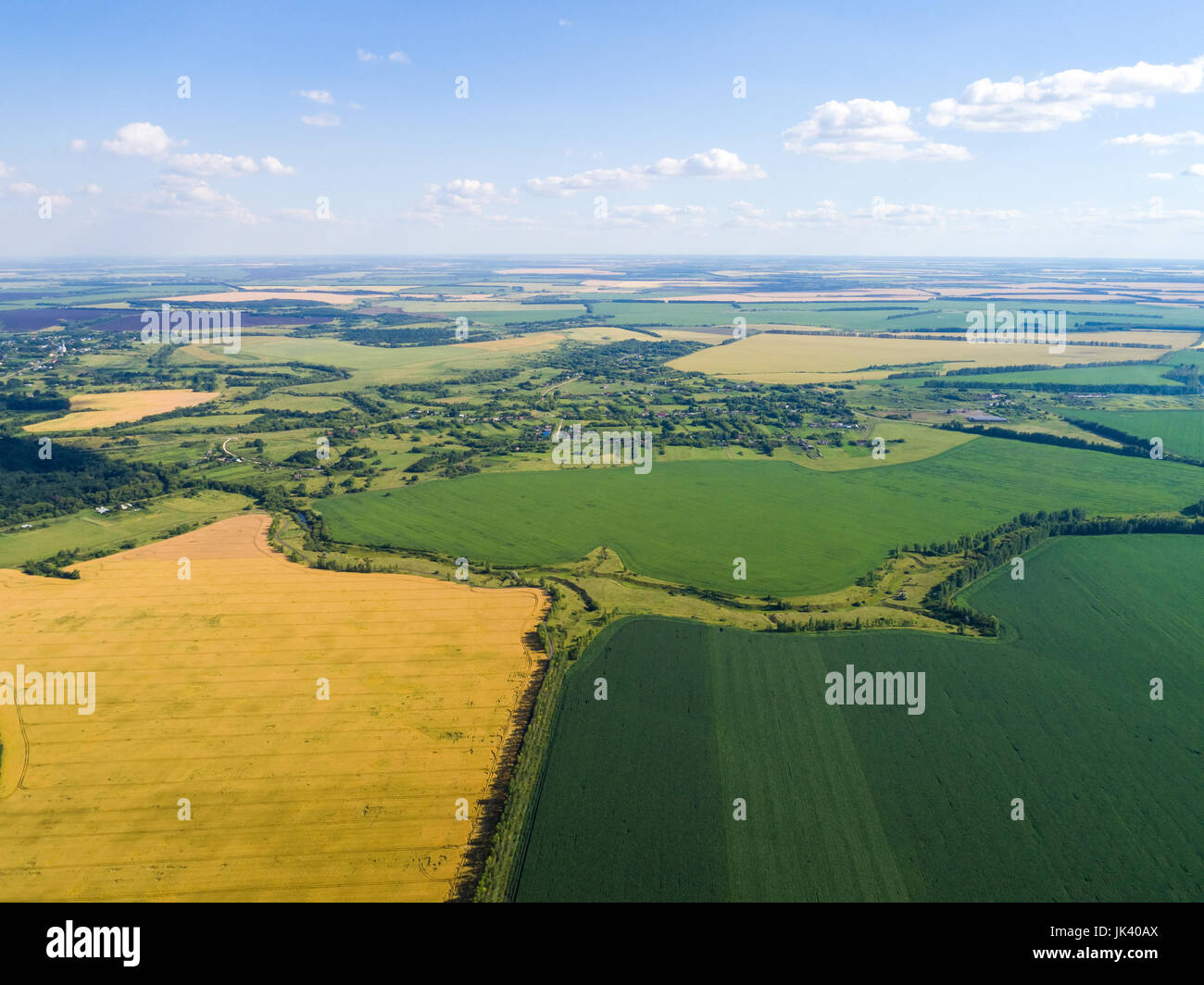 Rural landscape with village and cereal fields Stock Photo - Alamy