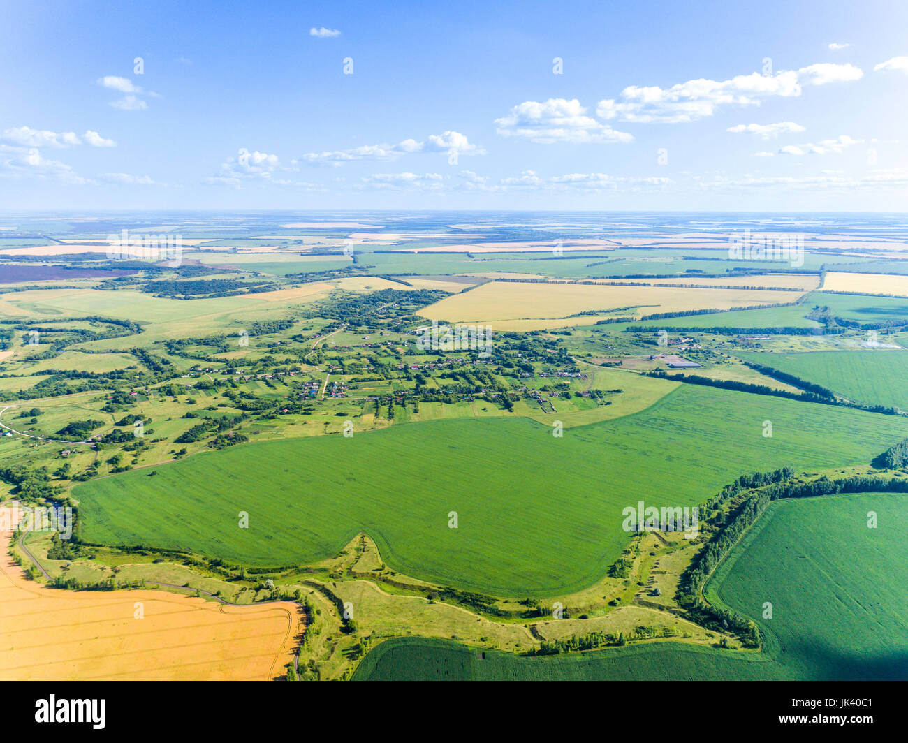 Rural landscape with village and cereal fields Stock Photo - Alamy