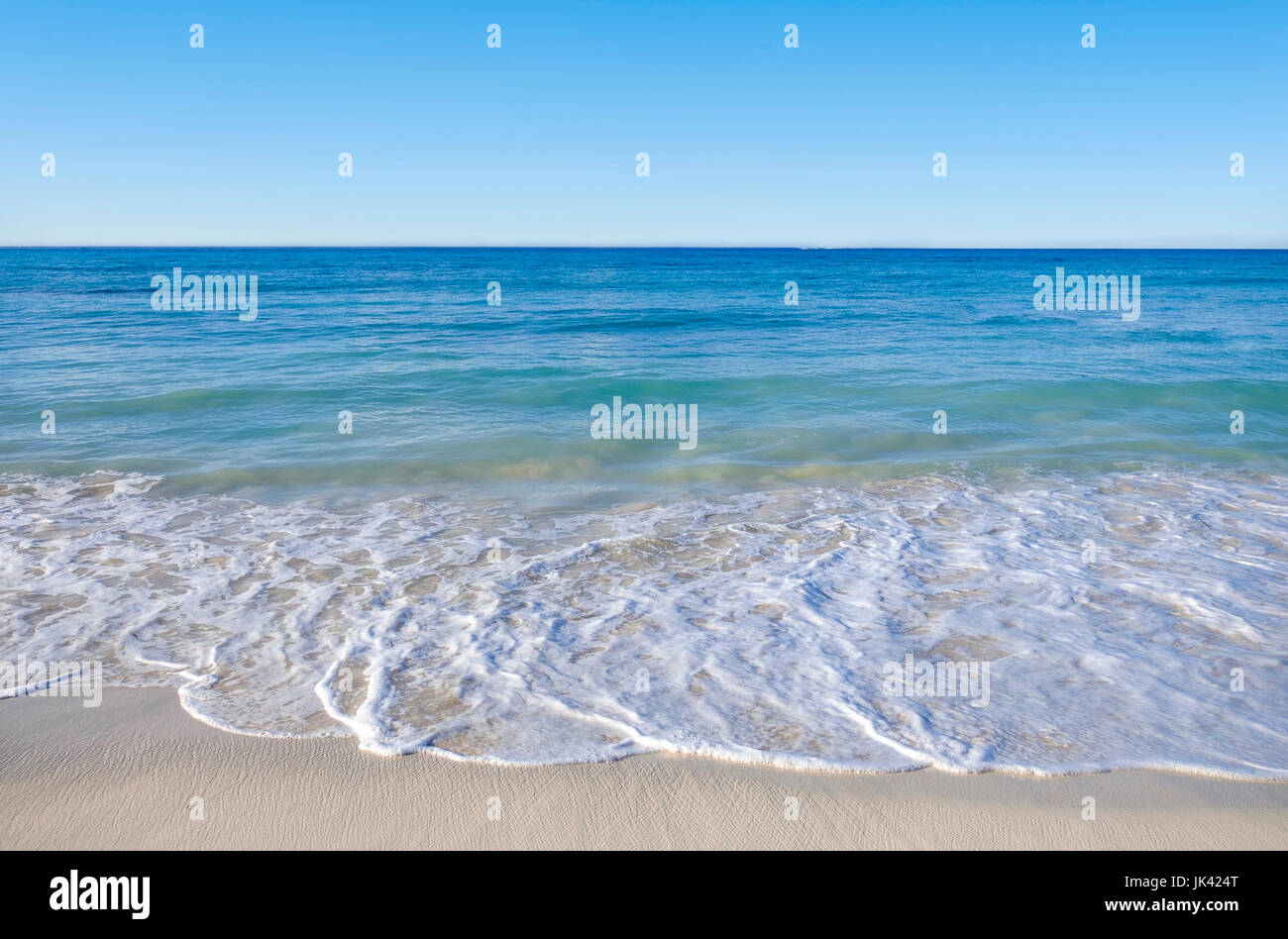 Ocean waves on beach Stock Photo