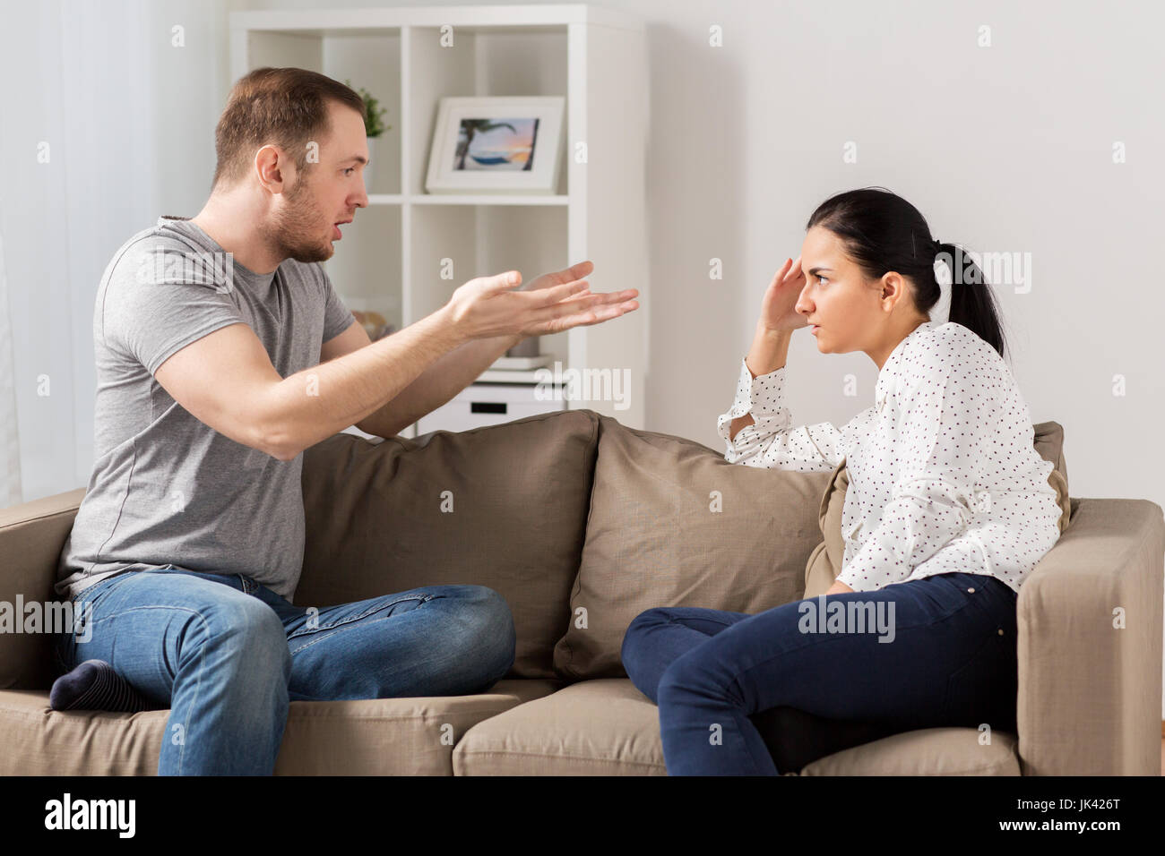unhappy couple having argument at home Stock Photo - Alamy
