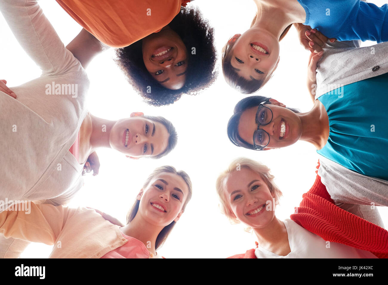 international group of happy smiling women hugging Stock Photo - Alamy
