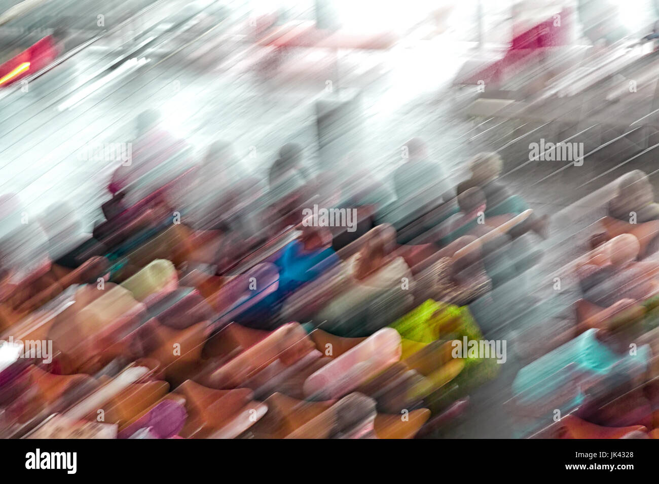 Picture with camera made motion blur effect of a crowd of people ...