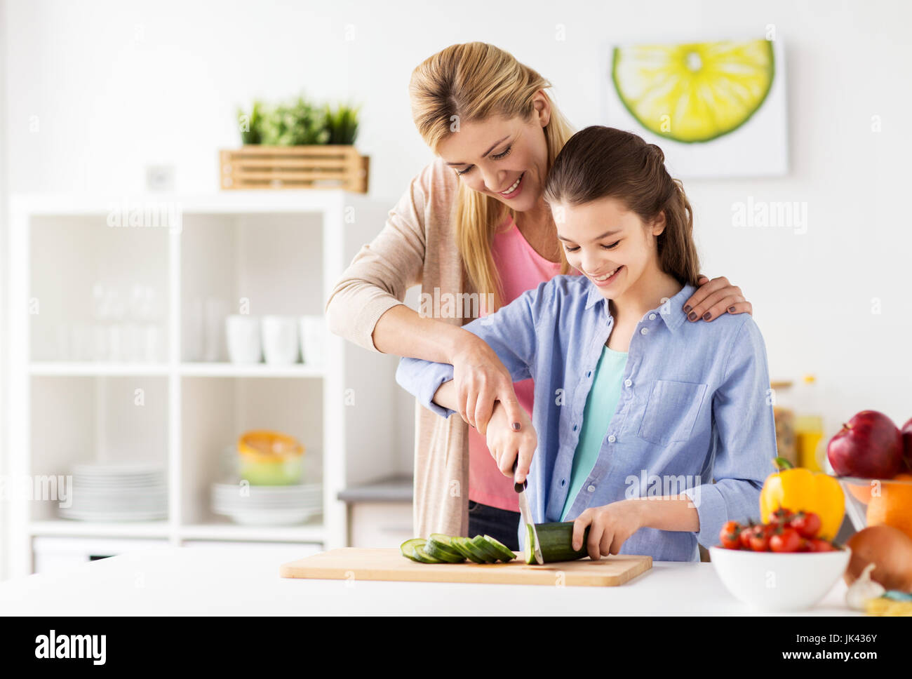 happy family cooking dinner at home kitchen Stock Photo - Alamy