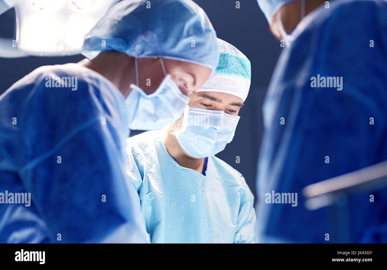 group of surgeons in operating room at hospital Stock Photo - Alamy
