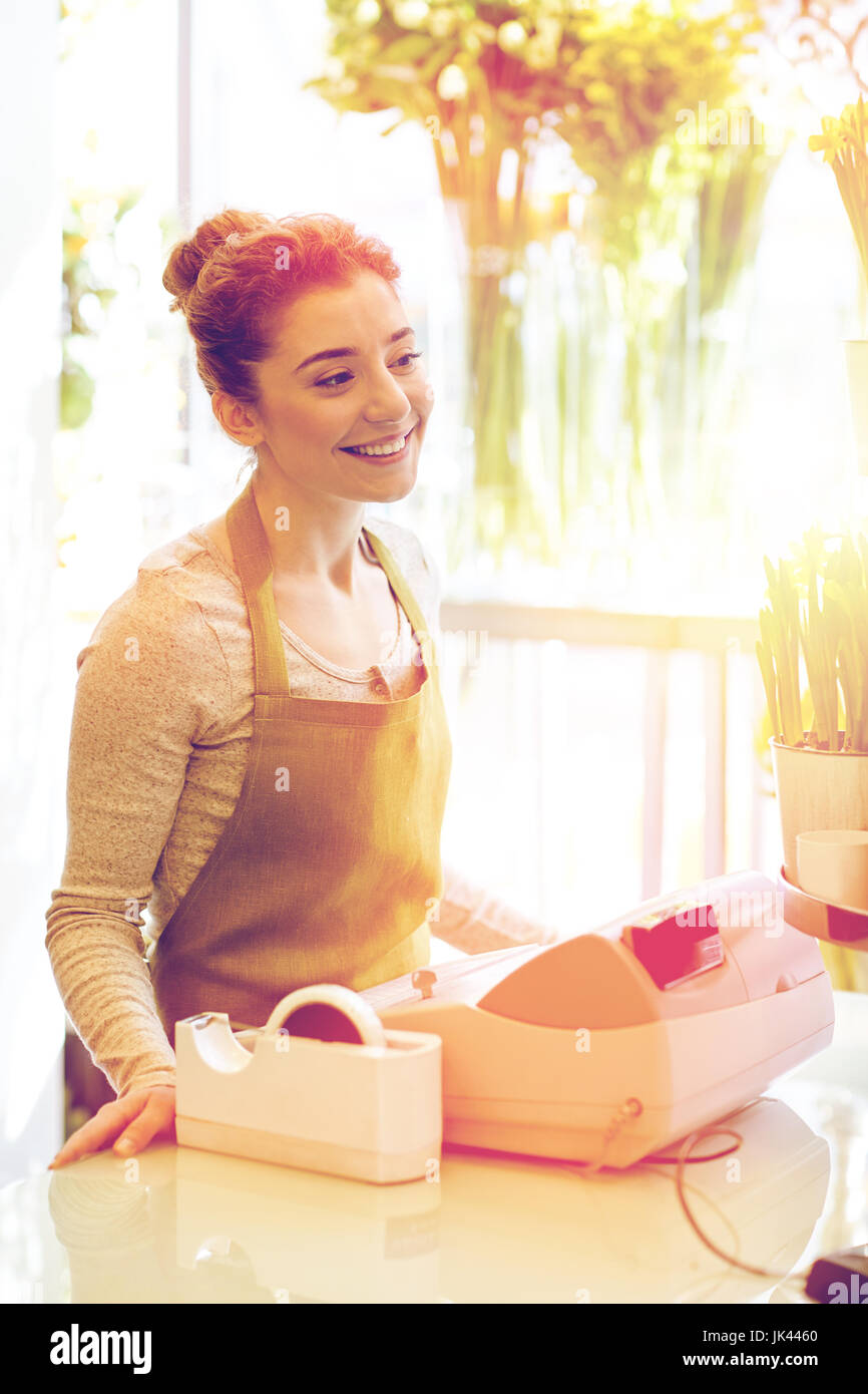 smiling florist woman at flower shop cashbox Stock Photo - Alamy