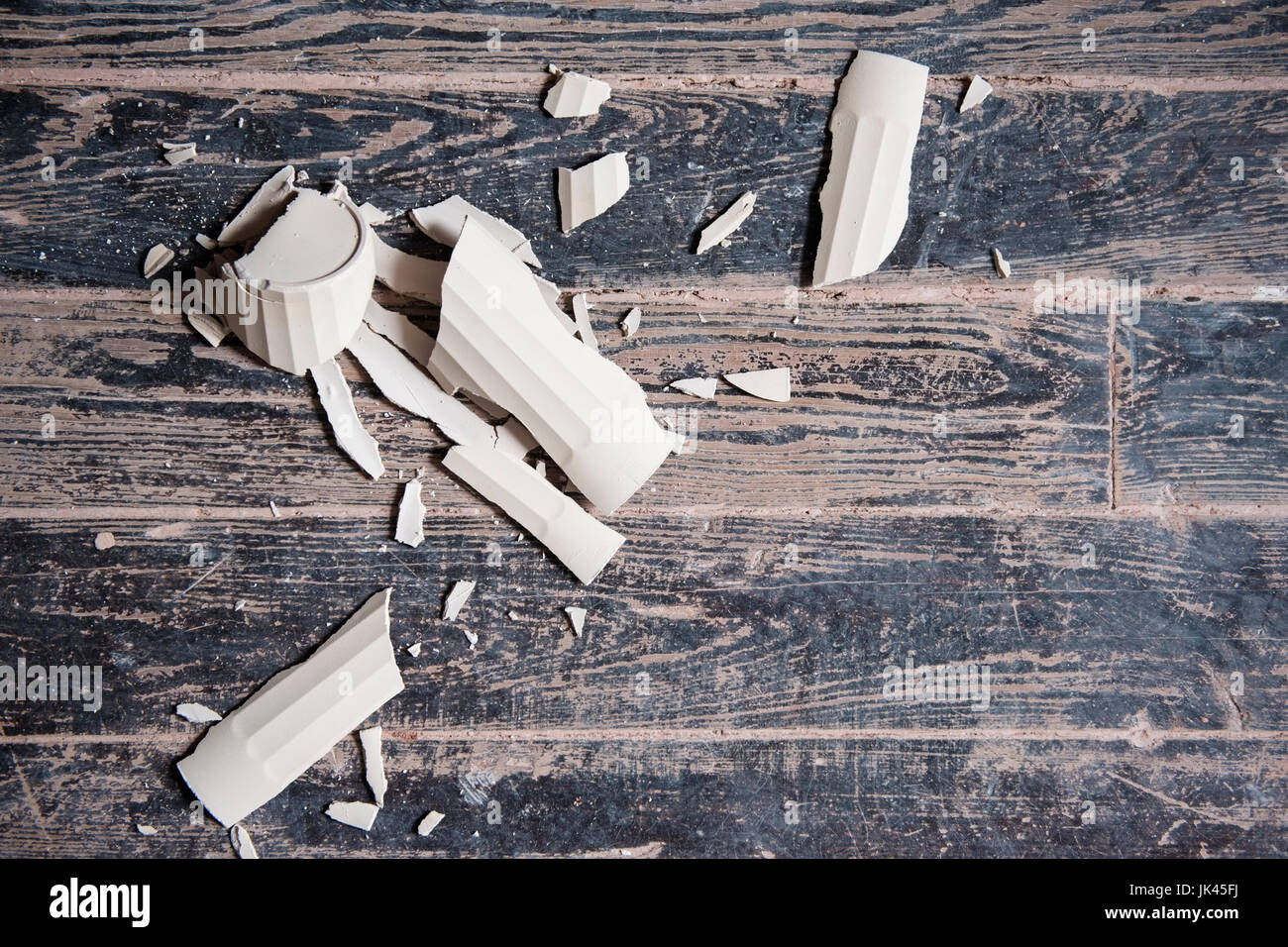 Broken cup floor hi-res stock photography and images - Alamy