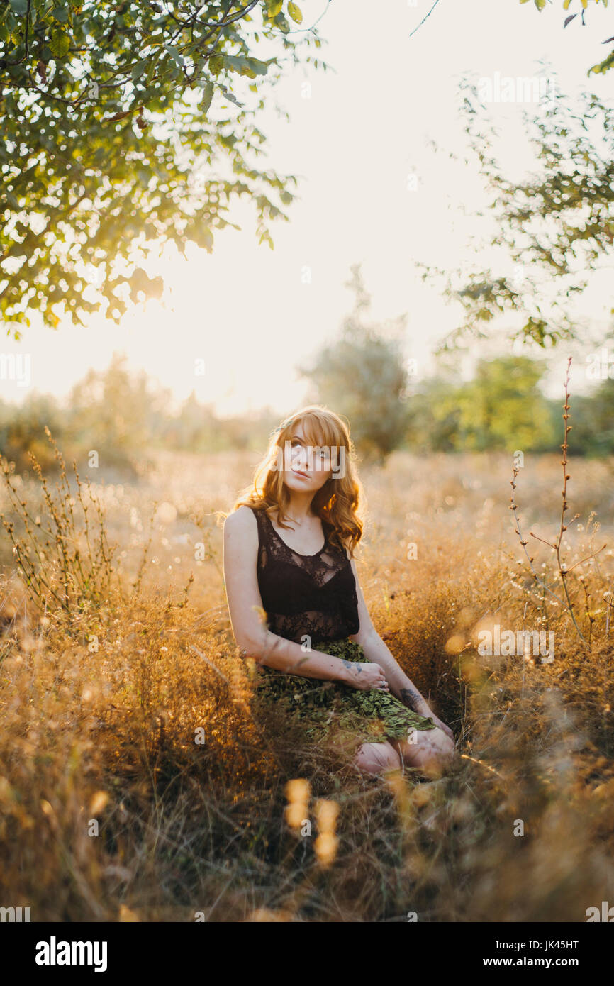 Blonde woman in kneeling hi-res stock photography and images - Alamy