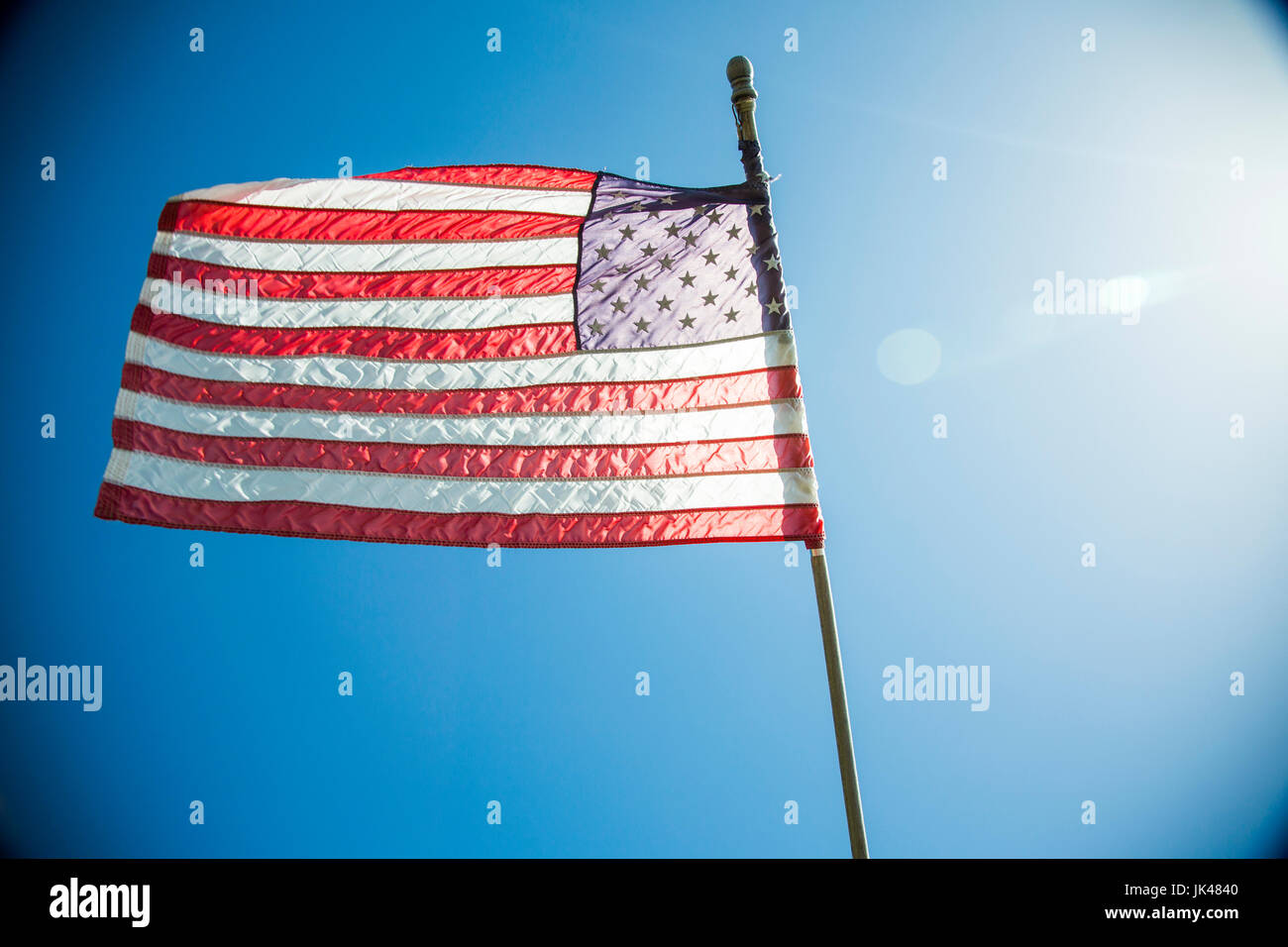 American Flag blowing in wind Stock Photo