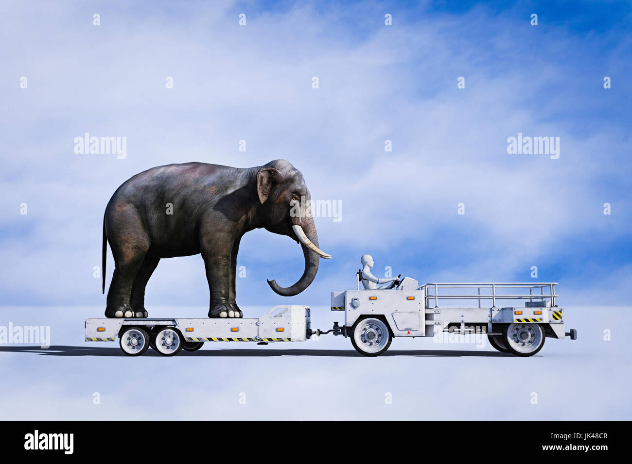 Robot driving tractor pulling elephant on trailer Stock Photo