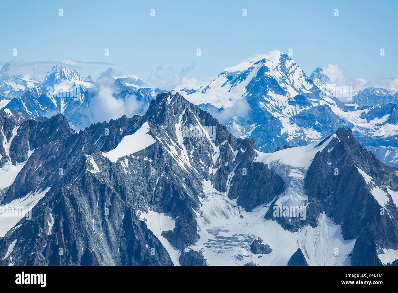 Ice, snow, and glaciers cling to the sides of Mont Blanc in the french Alps Stock Photo