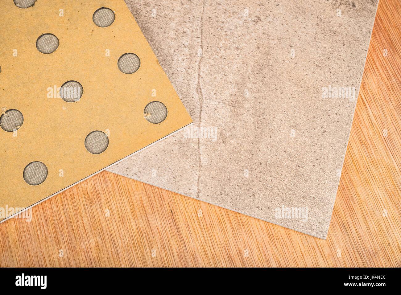 Closeup take of adhesive vinyl tiles, a modern construction material Stock Photo
