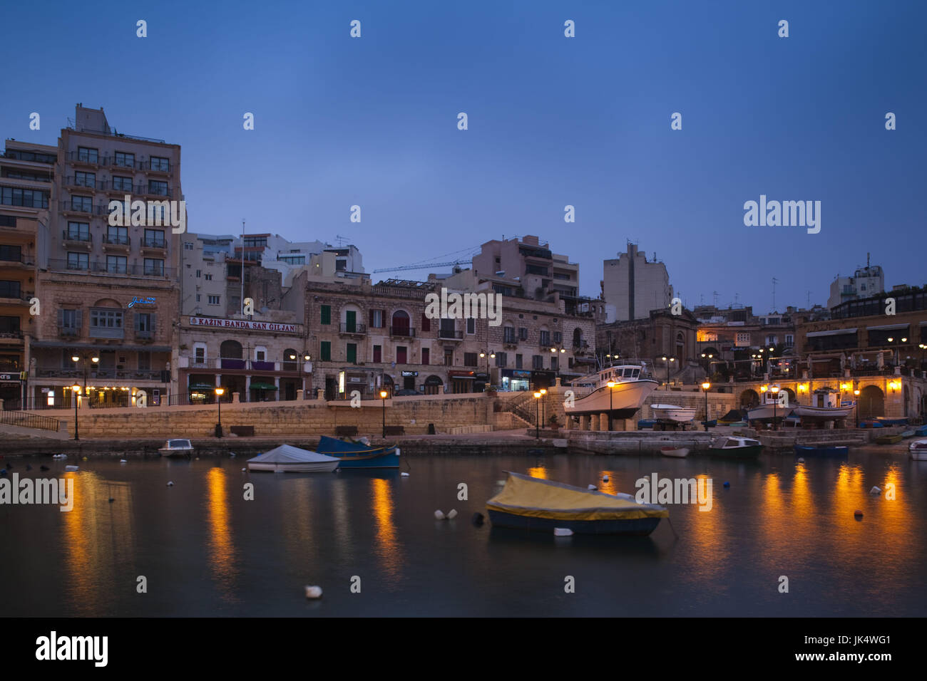 Malta, Valletta, St. Julian's, cafes on Spinola Bay, dawn Stock Photo