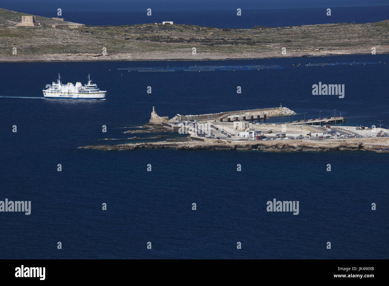 Malta, Northwest Malta, Cirkewwa, elevated view of Malta-Gozo ferry from Ras al Qammie Point cliffs Stock Photo