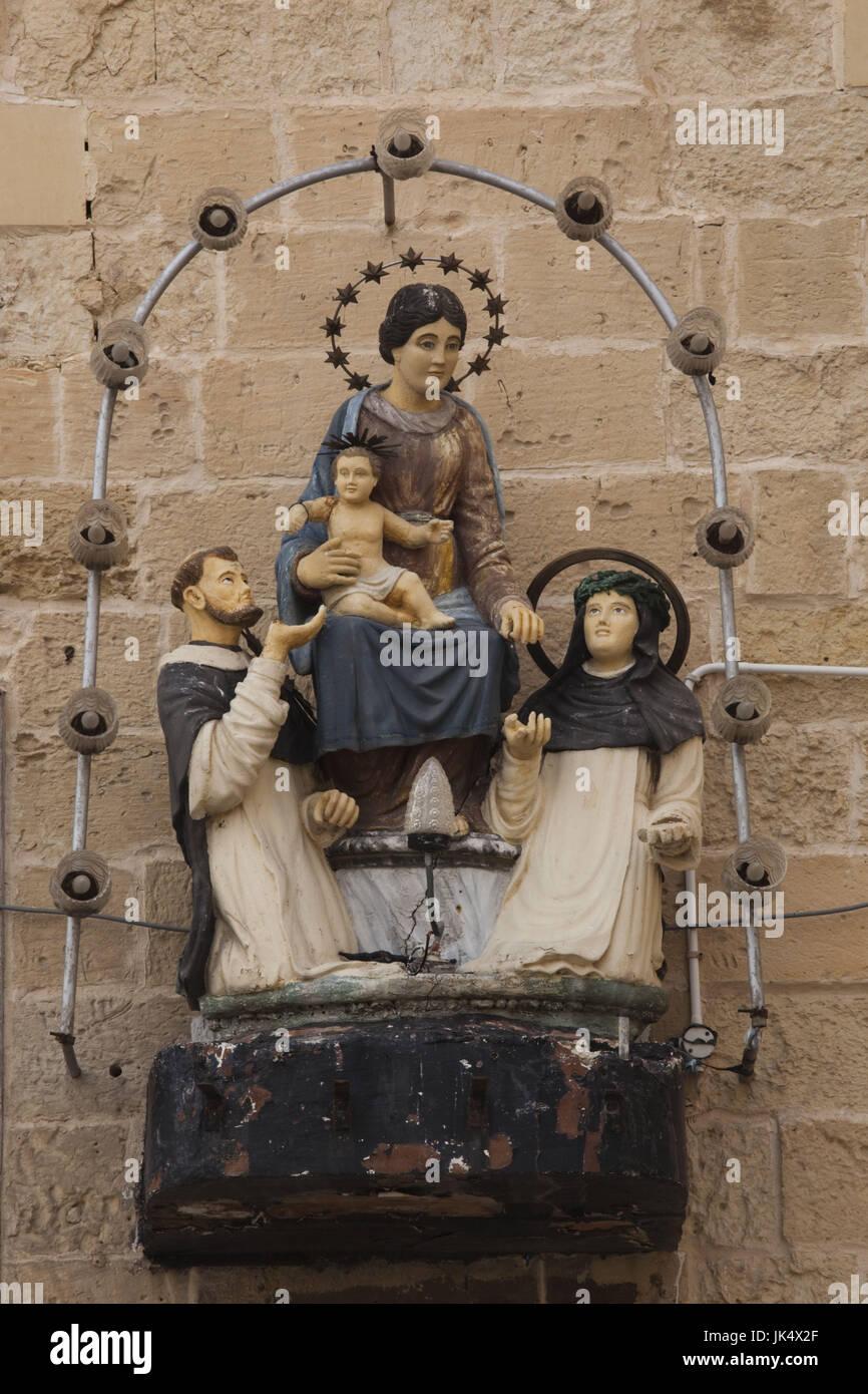 Malta, Valletta, Triq ir-Repubblika, Republic Street, religious sculpture Stock Photo