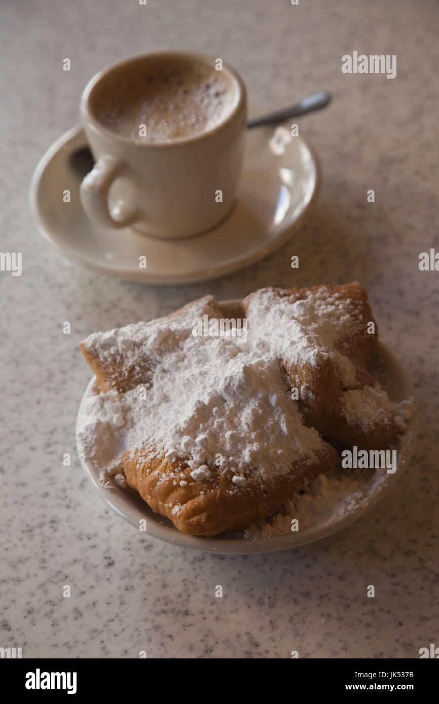USA, Louisiana, New Orleans, French Quarter, beignets and cafe au lait at Cafe Du Monde Stock Photo