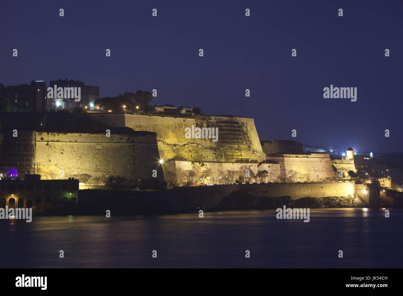 Malta, Valletta, city walls by St. Andrew's Bastion, evening Stock Photo
