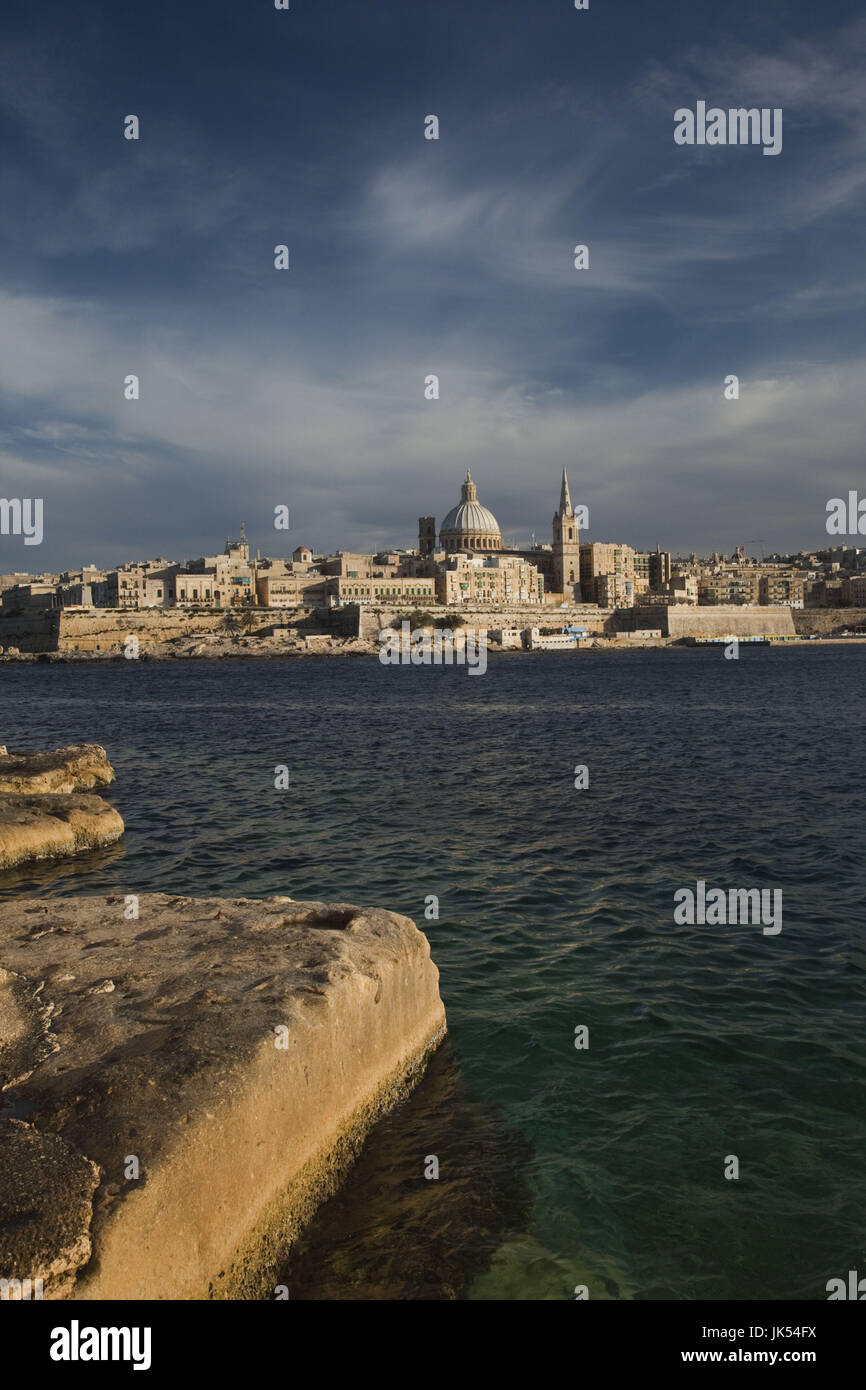 Malta, Valletta, skyline with St. Paul's Anglican Cathedral and Carmelite Church from Sliema, sunset Stock Photo