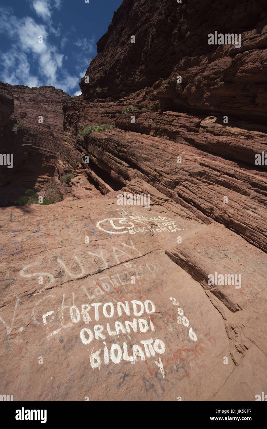 Argentina, Salta Province, Quebrada de Cafayate canyon, red rocks and graffiti by the Garganta del Diablo Stock Photo