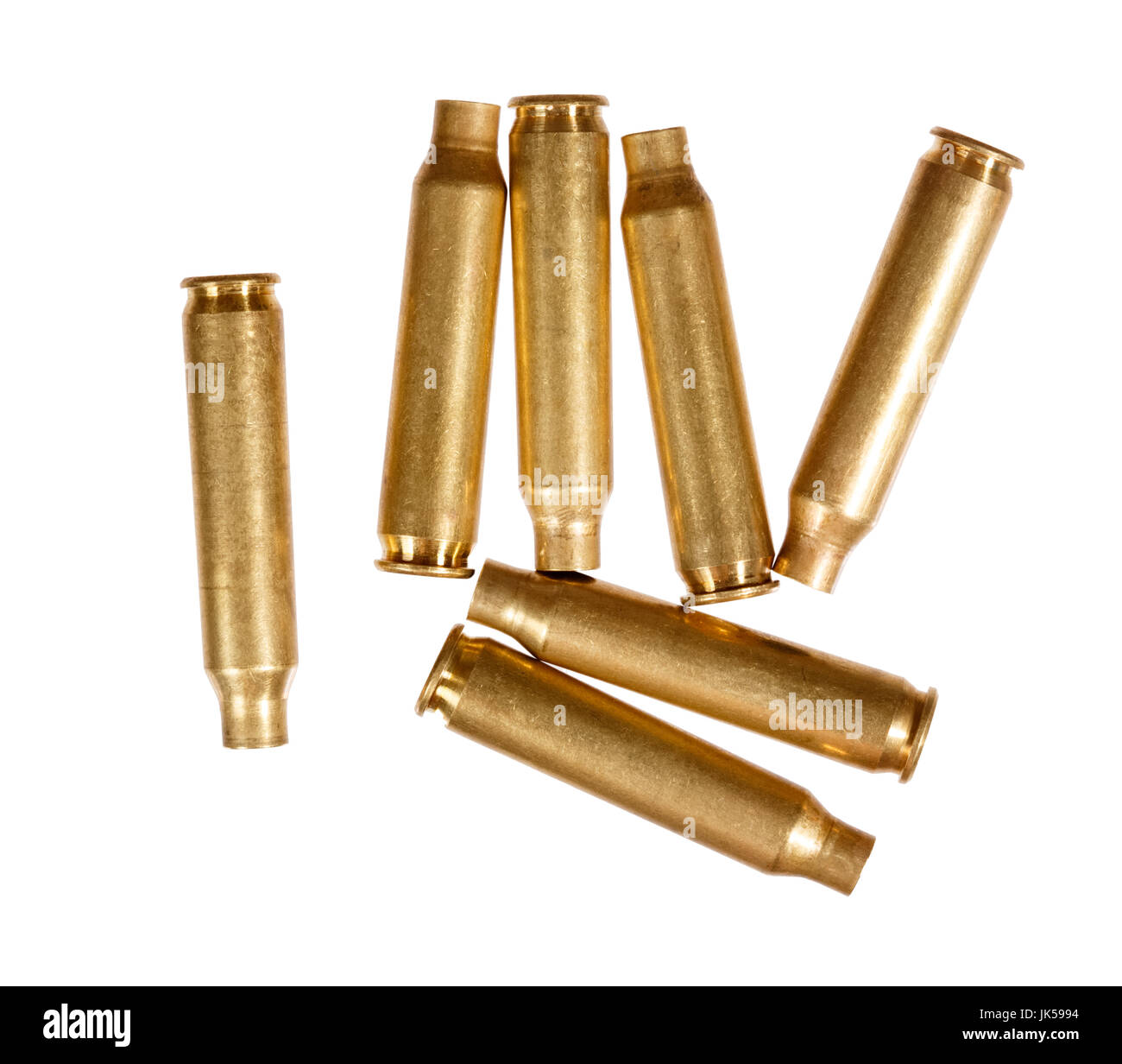 Used rifle cartridges isolated on white. Stock Photo
