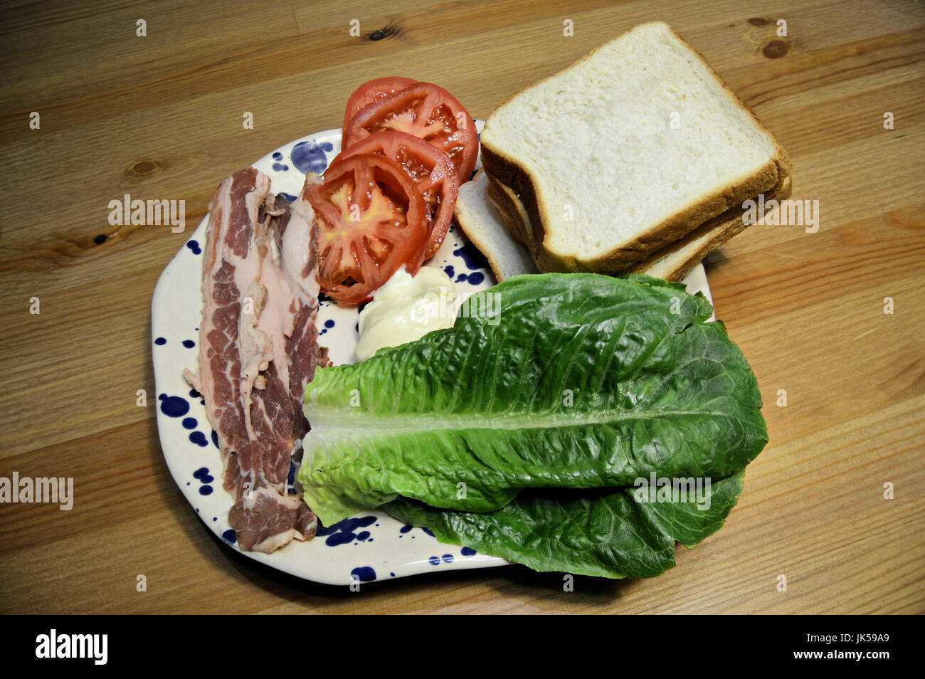 BLT ingredients bacon , lettuce and tomato Stock Photo