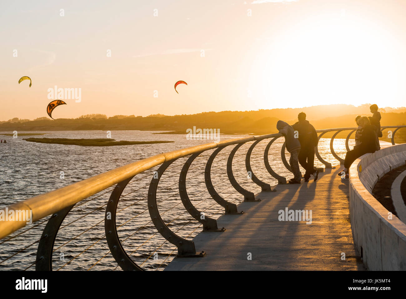 Jose Ignacio, Uruguay, April 1, 2017 -  Kiters on the Garzon Bay are using last summer days Stock Photo