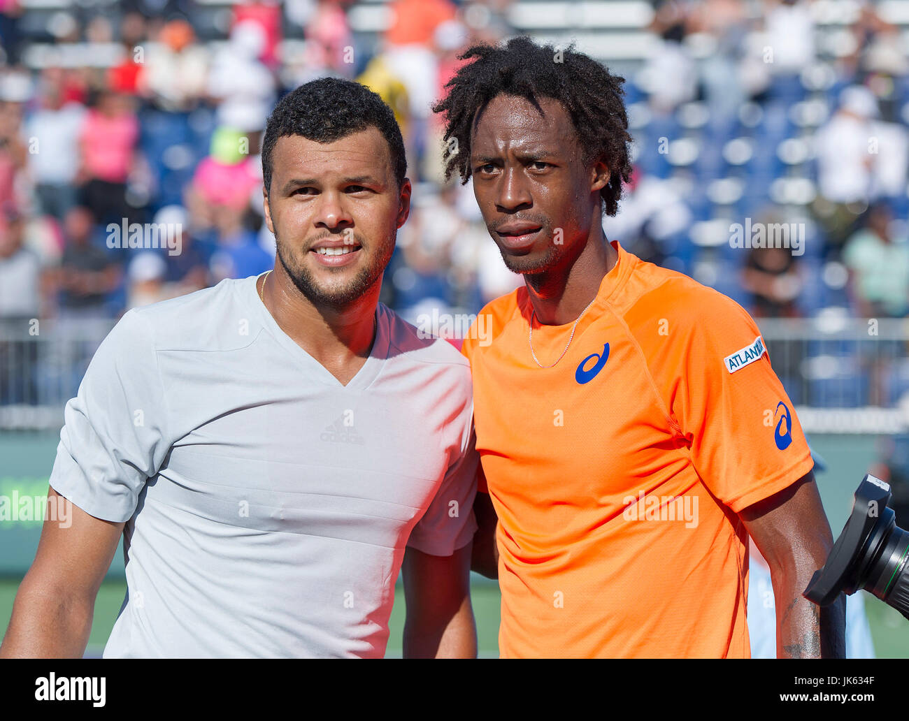 KEY BISCAYNE, FL - March 29: Gael Monfils (FRA) and Jo-Wilfried Tsonga  (FRA) pose together after monfiles defeats Tsonga 64 76(4) at the 2015  Miami Open at the Crandon Tennis Center in