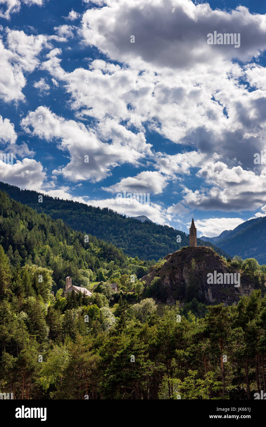 The clock tower of Meolans Revel village in summer. Alpes-de-Haute-Provence, Alps, France Stock Photo