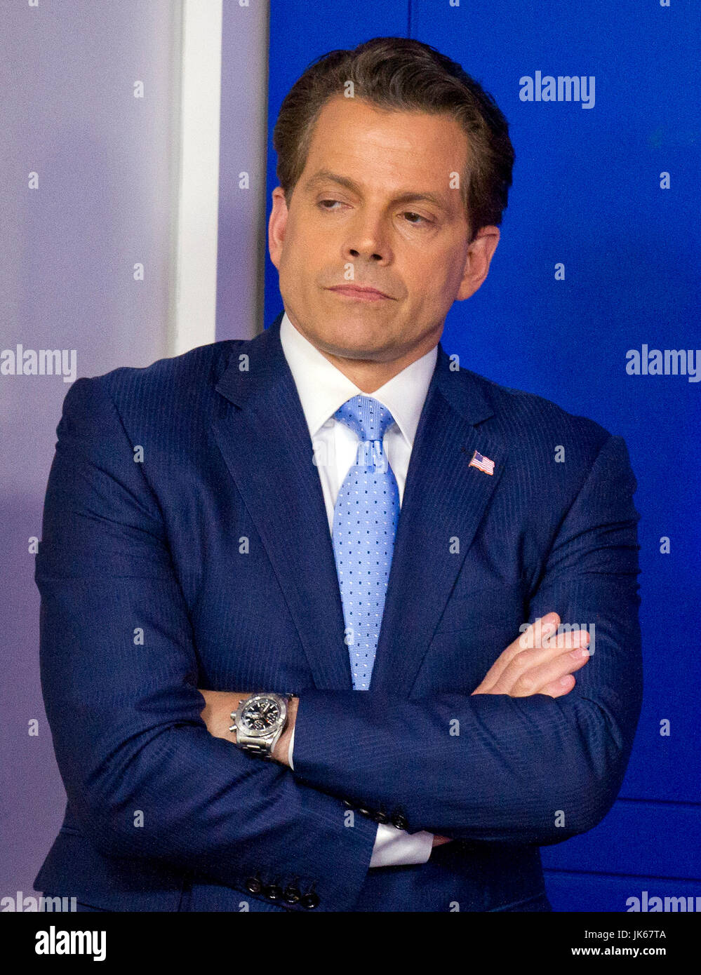 White House communications director Anthony Scaramucci listens