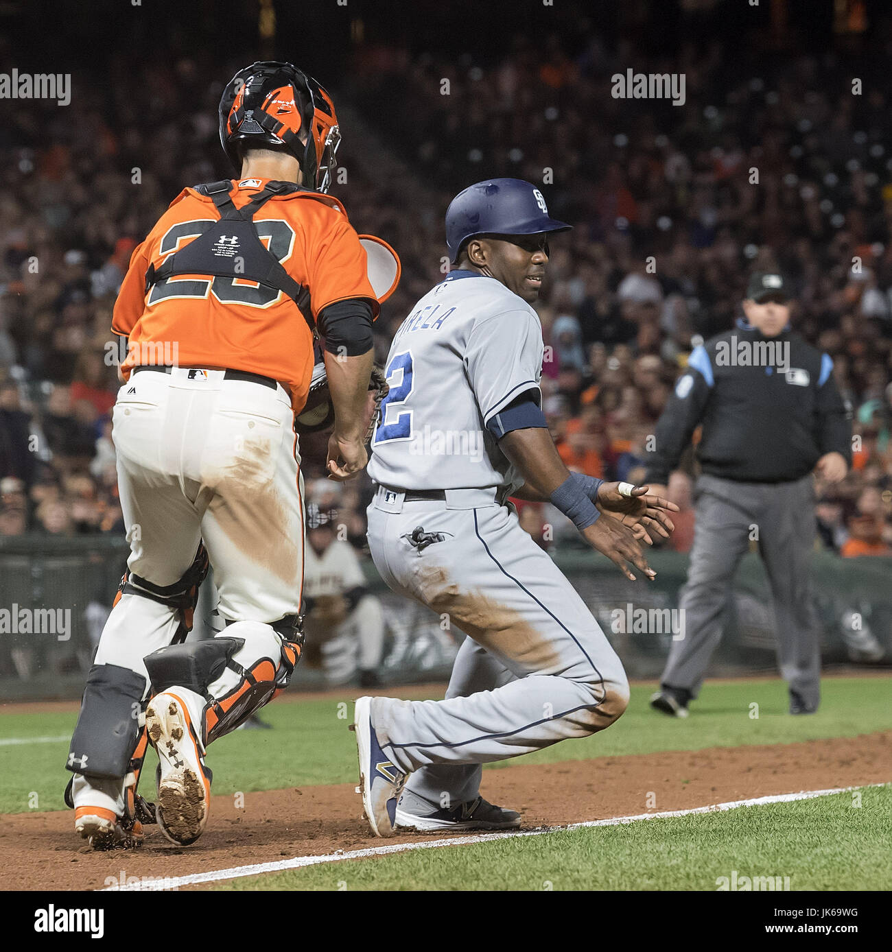 San Francisco, California, USA. 21st July, 2017. San Francisco Giants catcher Buster Posey (28) goes to put a tag on San Diego Padres second baseman Jose Pirela (2), during a MLB game between the San Diego Padres and the San Francisco Giants at AT&T Park in San Francisco, California. Valerie Shoaps/CSM/Alamy Live News Stock Photo