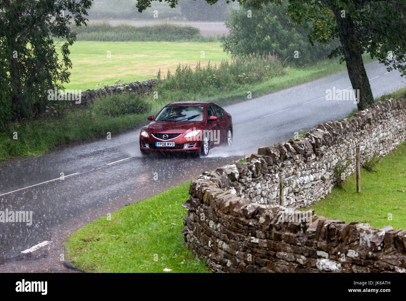 B6278, Barnard Castle, County Durham UK.  Saturday 22nd July 2017. UK Weather.  Torrential downpours are creating hazardous driving conditions on the B6278 in County Durham this afternoon. Credit: David Forster/Alamy Live News. Stock Photo
