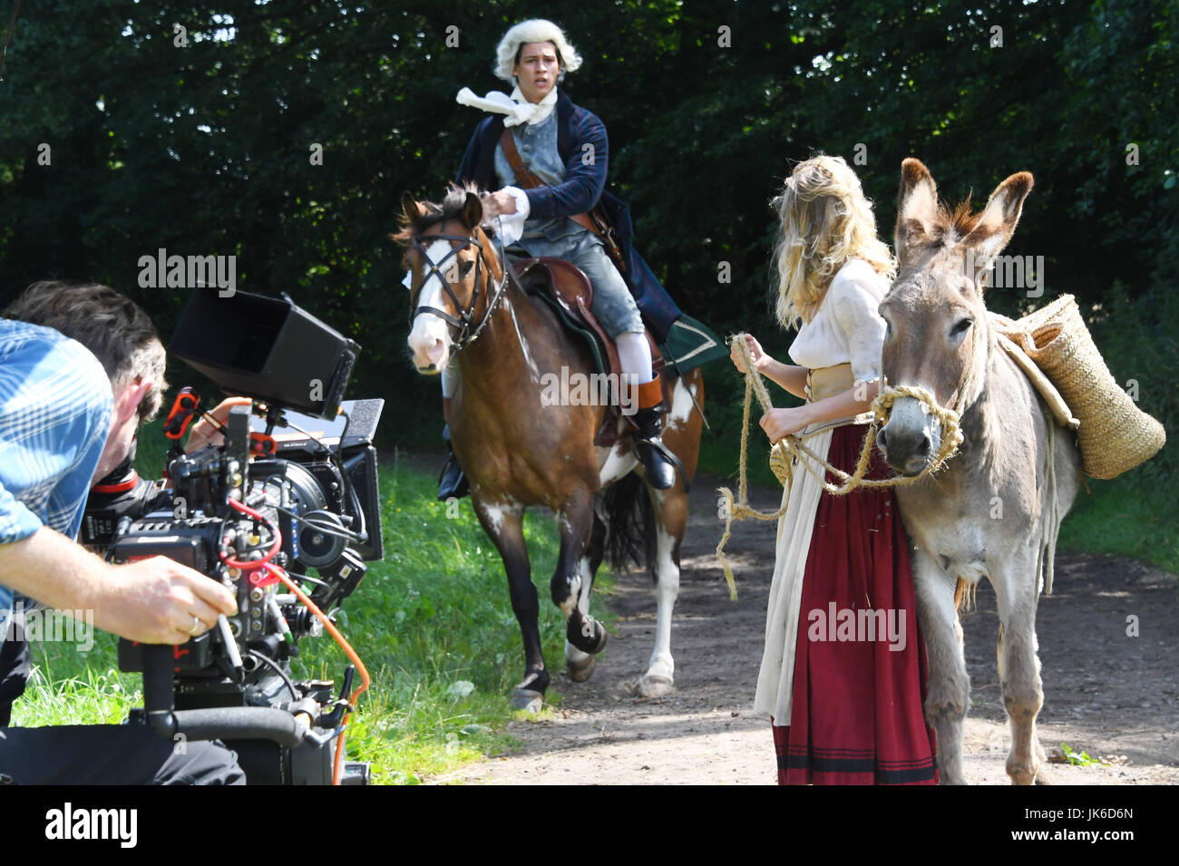 Wiesenburg, Germany. 20th July, 2017. The actors Emilio Sakraya and Jeanne Goursaud can be seen during the shooting of the fairytale movie 'Der Schweinehirt' (lit. swineherd) in Wiesenburg, Germany, 20 July 2017. The movie wil be aired during the ARD-fairytale series 'Sechs auf einen Streich' (lit. six in a row) on Christmas. Photo: Bernd Settnik/dpa-Zentralbild/dpa/Alamy Live News Stock Photo
