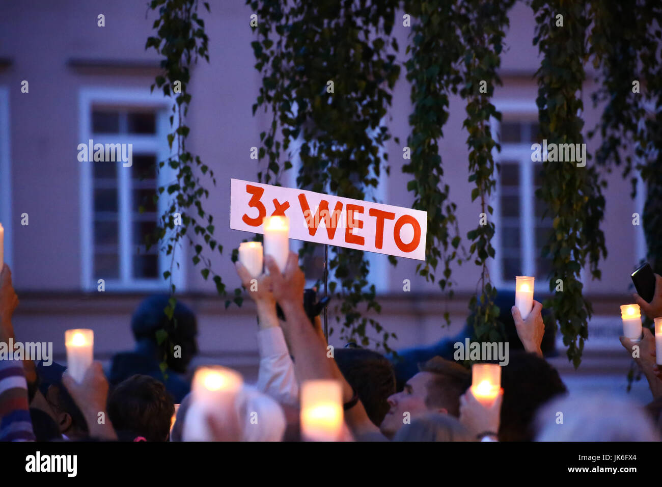 Poland, Warsaw, 22th July, 2017: Mass protest agaist justice reforms hold in front of highest court at Krasinskich Square. Protestors demand for Presidential veto against the new law and court order, lightning up masses of candles. ©Jake Ratz/Alamy Live News Stock Photo