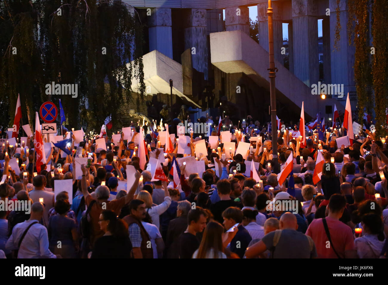 Poland, Warsaw, 22th July, 2017: Mass protest agaist justice reforms hold in front of highest court at Krasinskich Square. Protestors demand for Presidential veto against the new law and court order, lightning up masses of candles. ©Jake Ratz/Alamy Live News Stock Photo