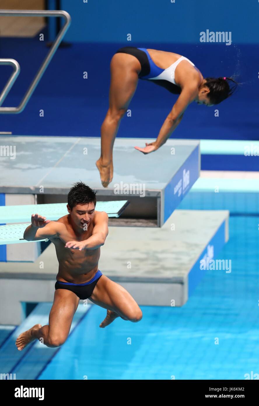 (170723) -- July 23,  2017 (Xinhua) -- Julian Sanchez (L) of Mexico falls from his board accidentally during the Mixed 3m Springboard Synchro final of Diving at the 17th FINA World Championships at Duna Arena in Budapest, Hungary on July 22, 2017. Arantxa Chavez Munoz and Julian Sanchez of Mexico placed 13th with 223.80 points. (Xinhua/Gong Bing) Stock Photo