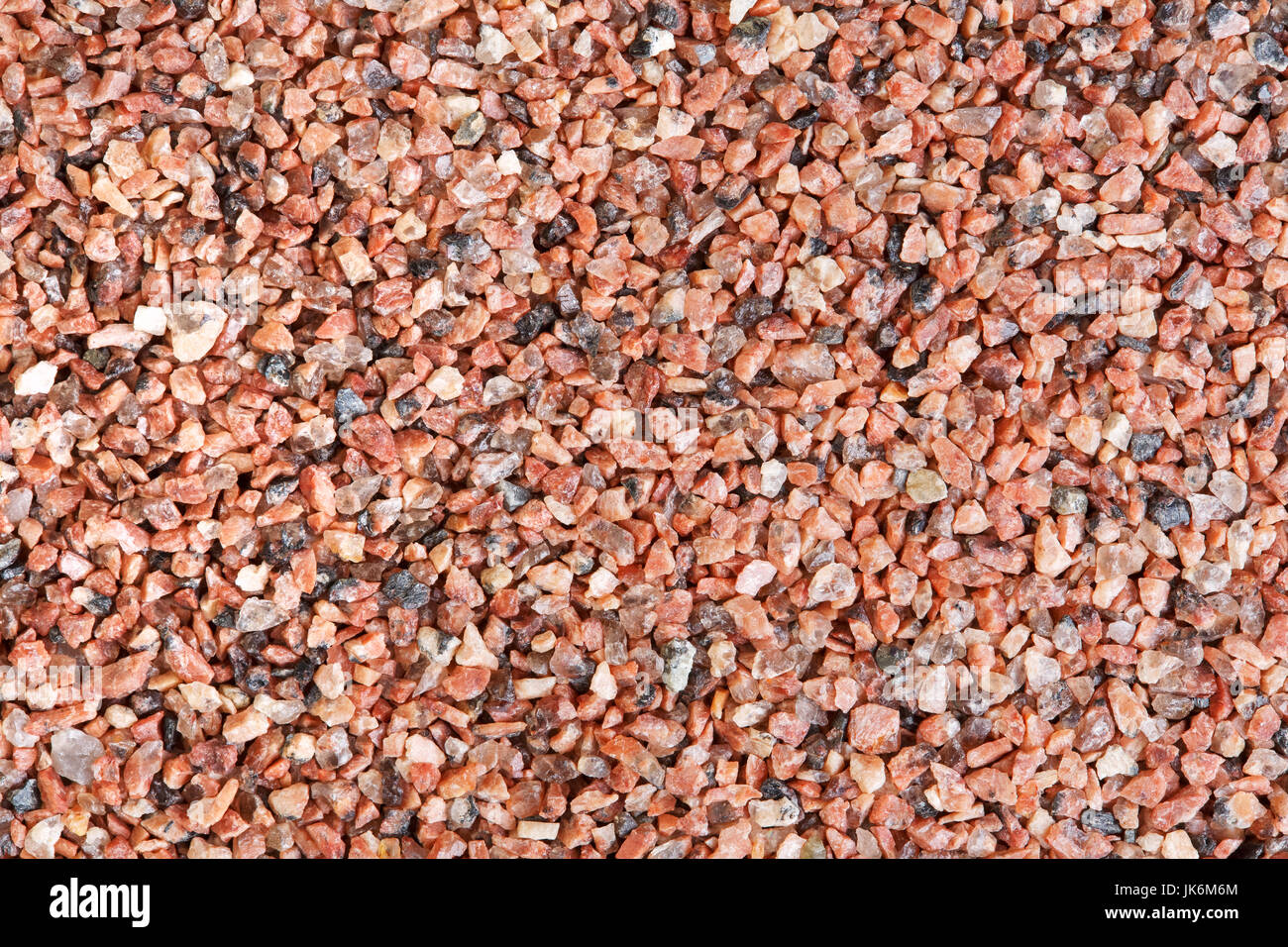 Close-up photo of red sand texture. Stock Photo