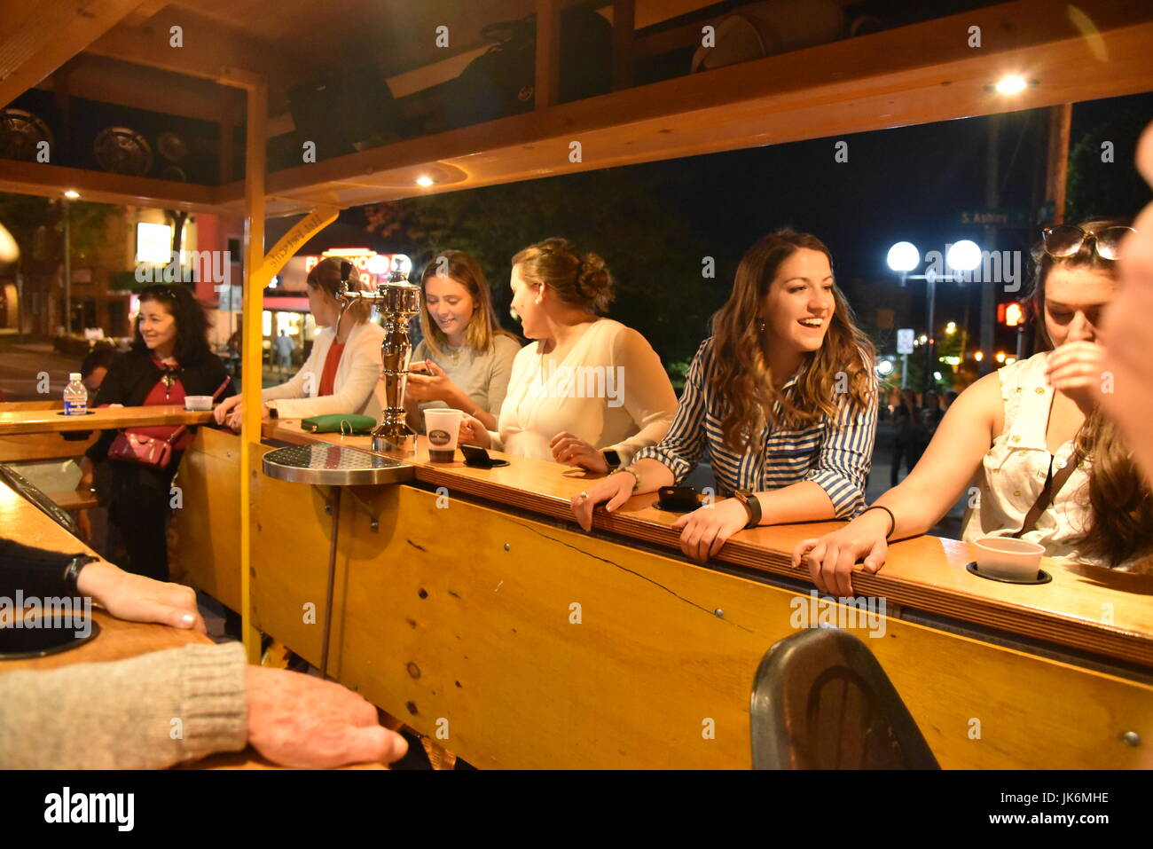 High Five Pedal tours with passengers bicycling through the streets of