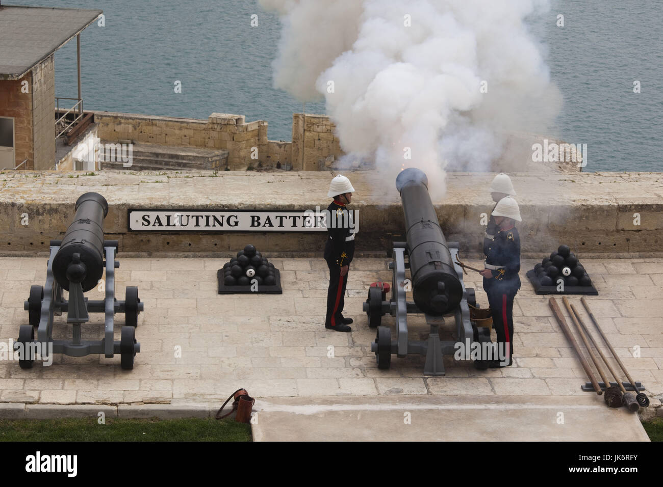 Malta, Valletta, Saluting Battery, elevated view from Upper Barrakka Gardens, soldiers by the noonday gun Stock Photo